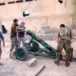 فرنسا تتمسك بضرب النظام السوري